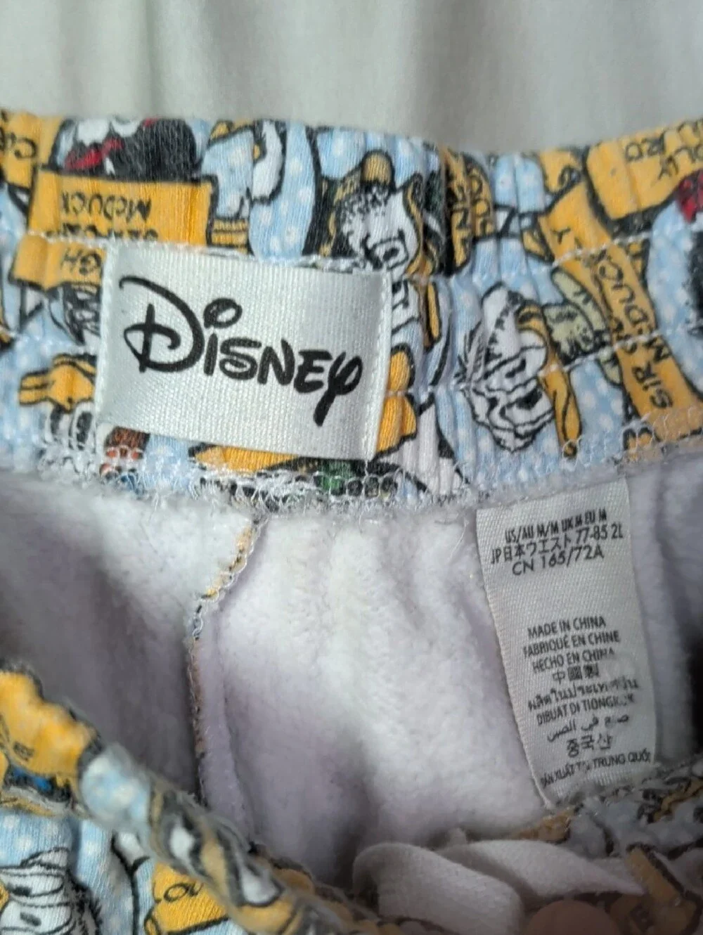 Disney White Jogger Pants with Yellow Character Print